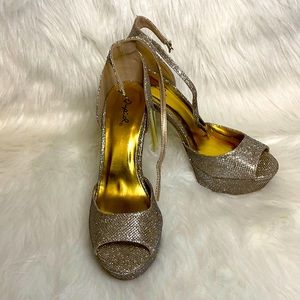 A pair of beautiful, open toed heels that sparkle.